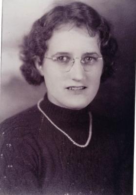 Ruth Campbell A black-and-white photo of a woman wearing a knitted sweater.