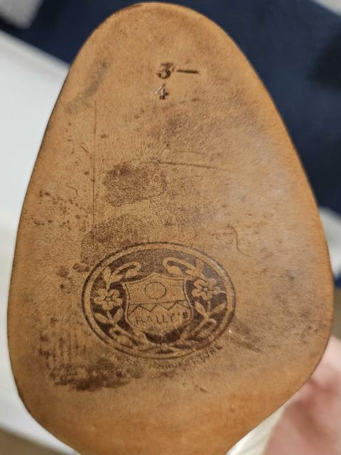 Bally shoe sole Sole of Montgomery’s ivory-coloured silk wedding slipper with “Bally’s Swiss Manufacture” and size “3–4” stamped on the leather.