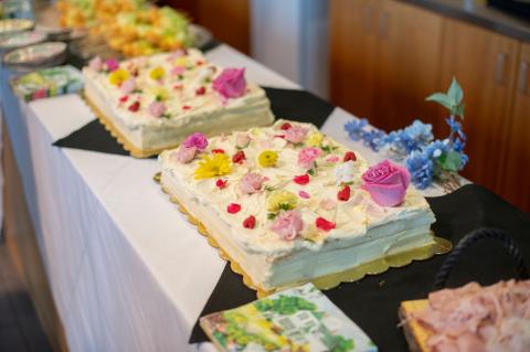 Conference 2024 Cake cake with floral decorations