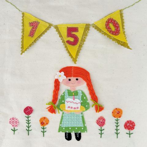 Hill Kelly Visual Anne holds a cake under a banner that reads "150"