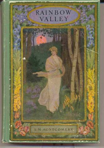 Rainbow Valley 1919 Drawn book cover of Rainbow Valley. A woman is standing in the forest with a scarf wrapped around her shoulders. The sun is setting in the distance.