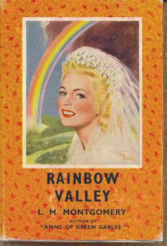 Painted book cover of Rainbow Valley. A picture of a woman wearing a white dress and veil smiling forward. A rainbow is in the background.  